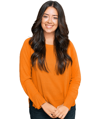 Smiling woman in orange sweater, hands clasped.