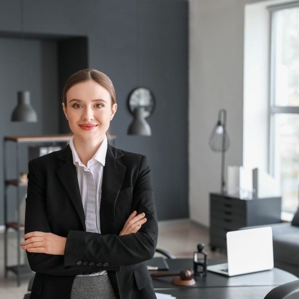 BLOG POWER ATTORNEY 1 Confident businesswoman in modern office environment.
